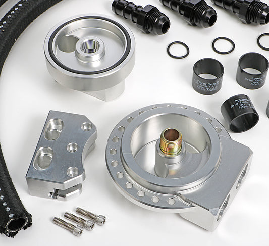 HAMBURGER'S PERFORMANCE PRODUCTS BILLET ALUMINUM MULTI-POSITION OIL FILTER RELOCATION KIT; HORIZONTAL PORT; 3-3/16 IN. I.D. 3-7/16 IN. O.D. OIL FILTER FLANGE; 13/16 IN.-16 NIPPLE- SB CHEVY & BB CHEVY 3374