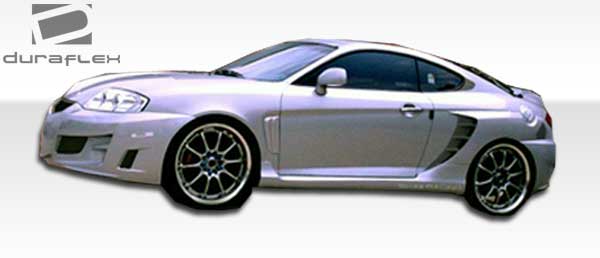 Extreme Dimensions Duraflex SC-5 Front Bumper Cover Compatible With 2003-2006 Hyundai Tiburon - 1 Piece - 100447