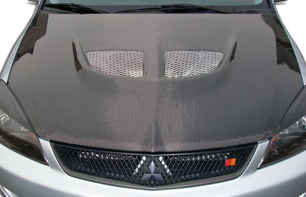 Carbon Creations Evo Hood Compatible With 2004-2007 Mitsubishi Lancer - 1 Piece - 104190