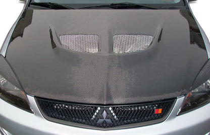 Carbon Creations Evo Hood Compatible With 2004-2007 Mitsubishi Lancer - 1 Piece - 104190
