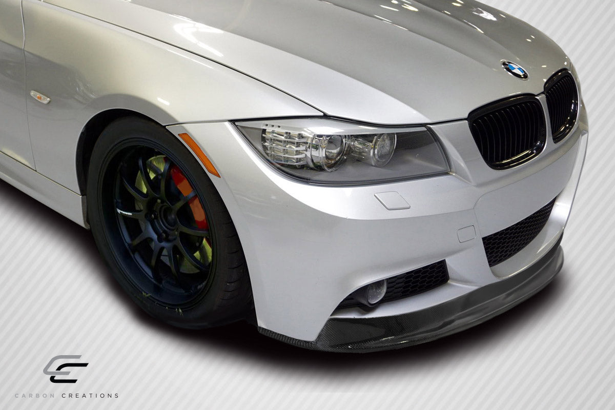 Carbon Creations AK-M Front Lip Spoiler Compatible With 2009-2011 BMW 3 Series - 1 Piece - 113382
