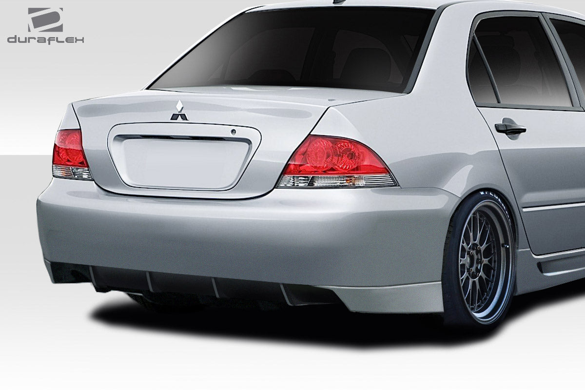 Extreme Dimensions Duraflex Trackstars Rear Bumper Cover Compatible With 2004-2007 Mitsubishi Lancer - 1 Piece - 114668