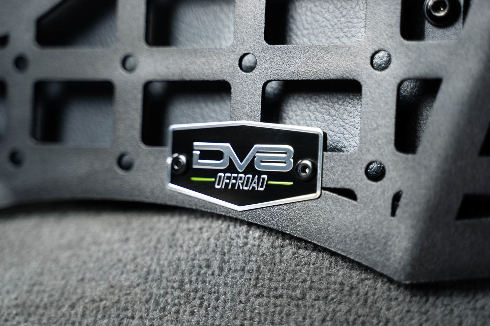 DV8 logo on the 2003-2009 Lexus GX 470 Center Console Molle Panels & Digital Device Bridge