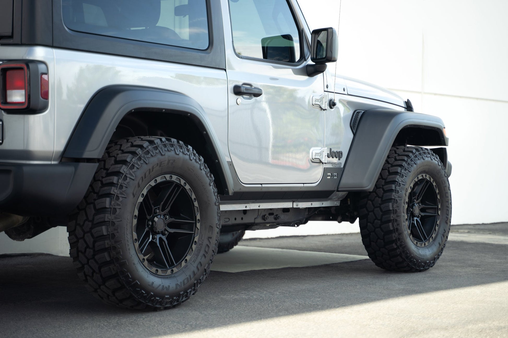 Rear angle shot of 2018-2023 Jeep Wrangler JL 2-Door Rock Skins