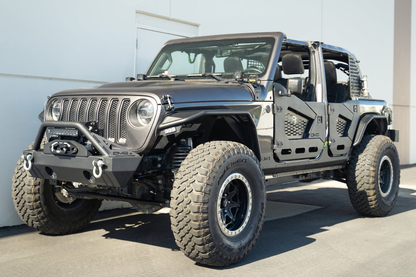 Front angle with 2018-2023 Jeep Wrangler JL 4-Door Rock Skins installed