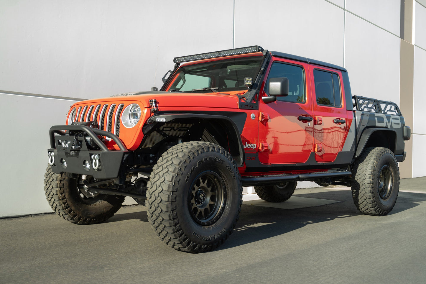 Front angle of 2020-2023 Jeep Gladiator JT Rock Skins installed