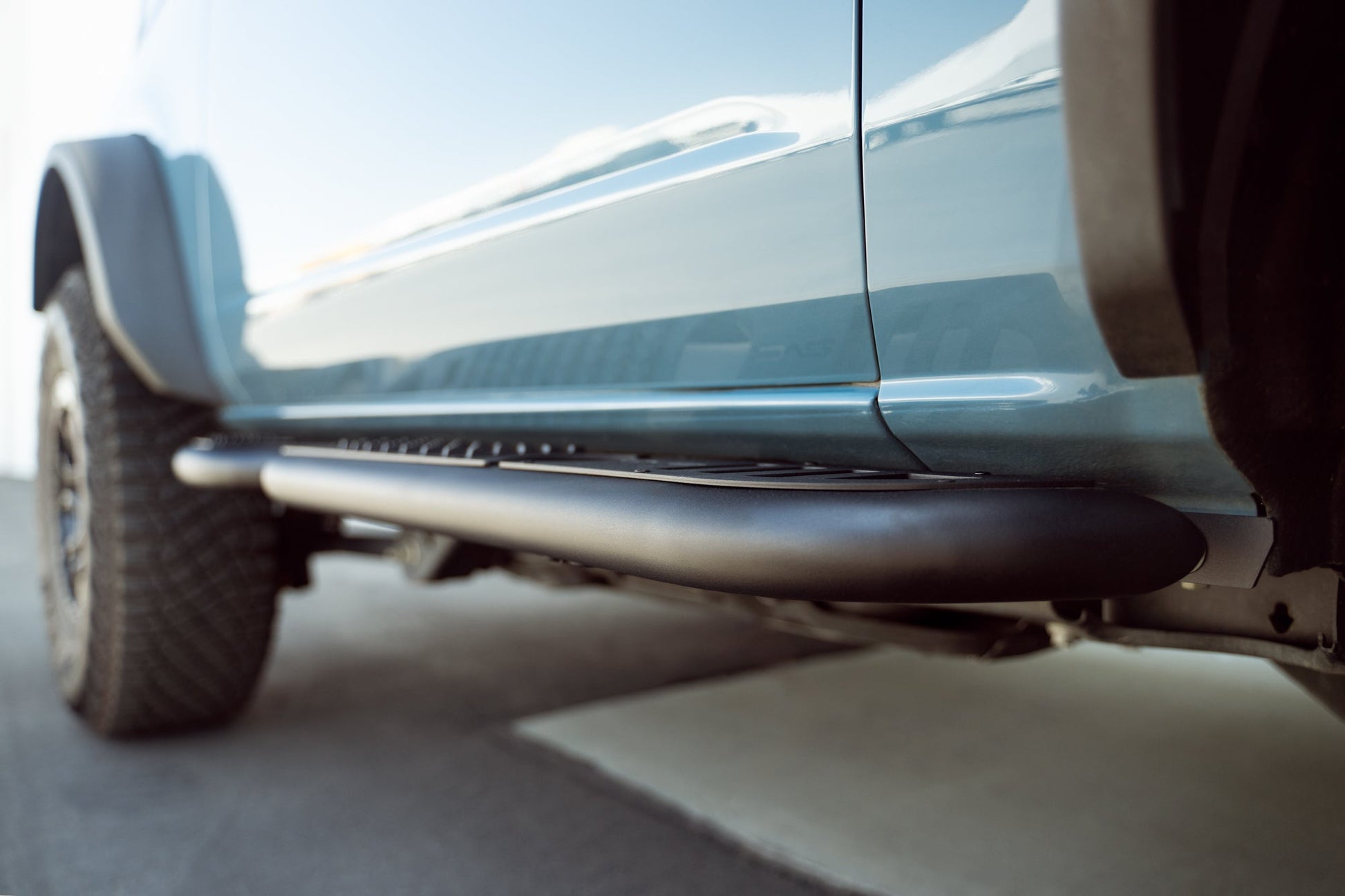 Close view of steps installed with the 2021-2023 Ford Bronco 2-Door Pinch Weld Covers