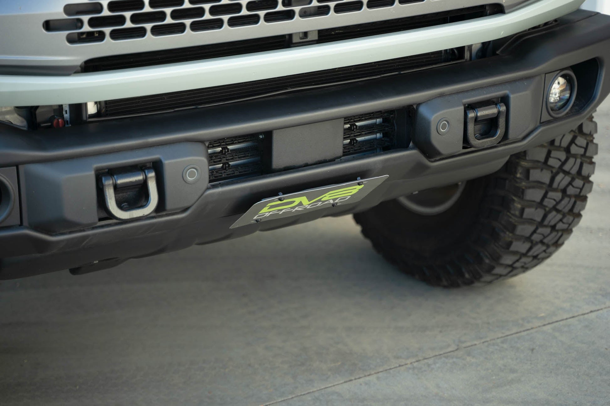 Showcasing angled fitment of Capable Bumper Slanted Front License Plate Mount for the 2021-2023 Ford Bronco