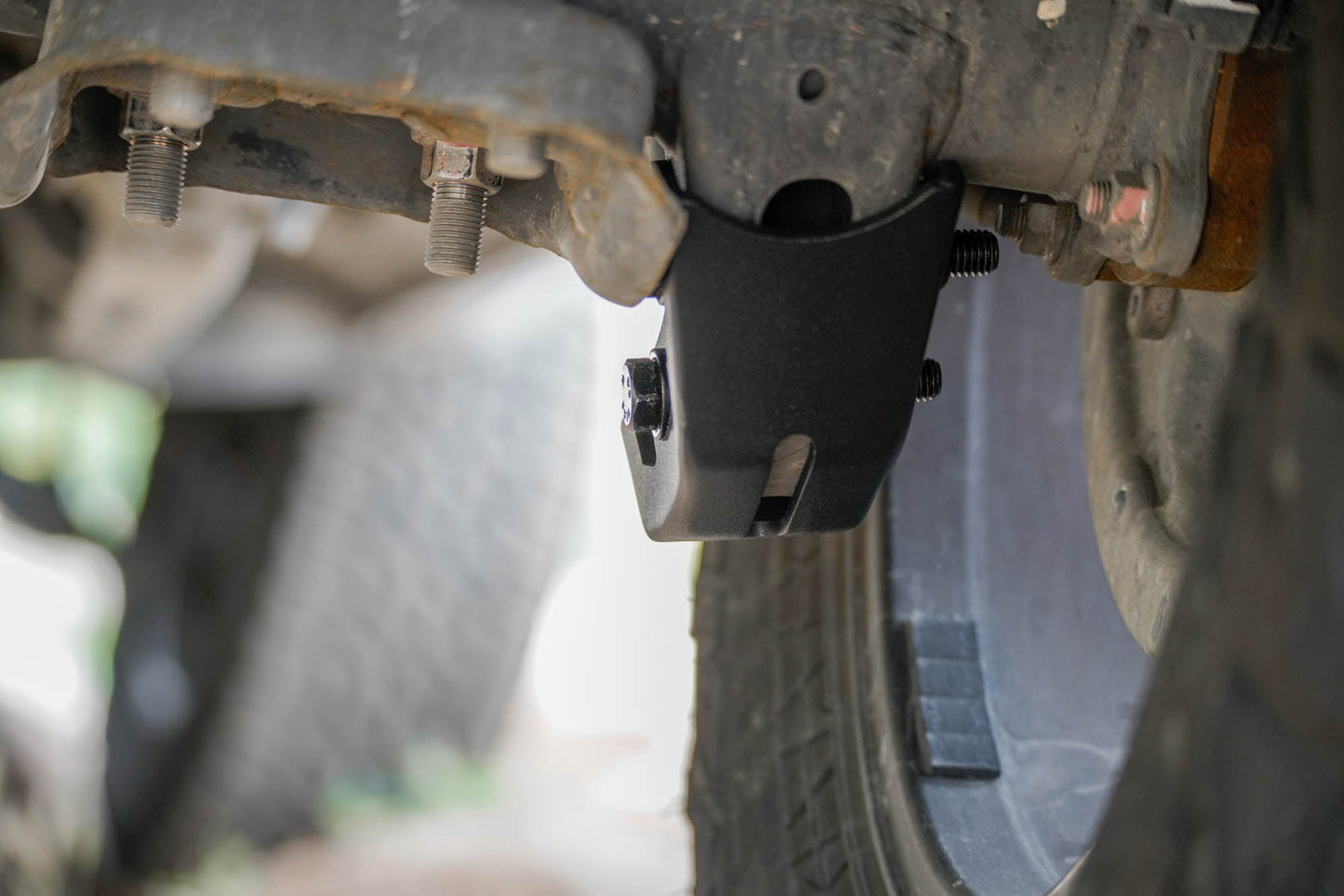 Drain Holes on the Rear Shock Skid Plates for the 3rd Gen Toyota Tacoma