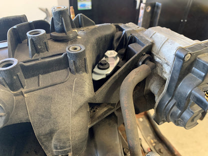 Combination plug and boost port for LS truck engine intakes