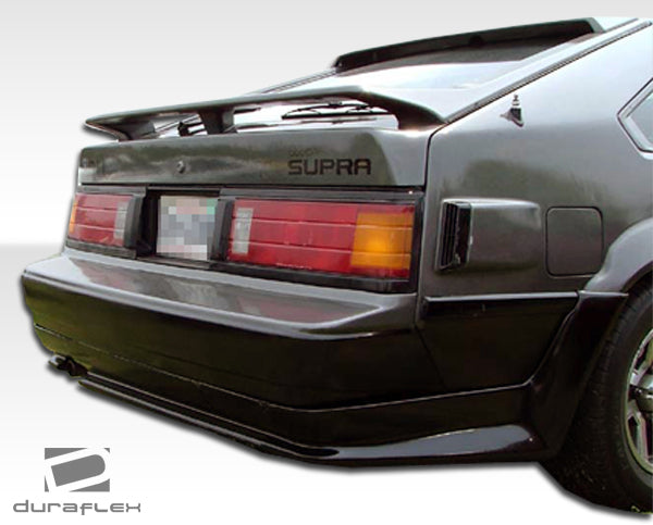 Extreme Dimensions Duraflex F-1 Rear Lip Add On Spoiler Compatible With 1982-1986 Toyota Supra - 1 Piece - 100690