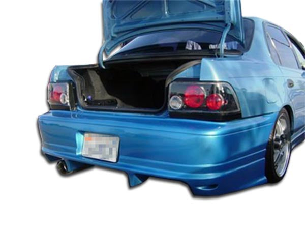 Extreme Dimensions Duraflex Bomber Rear Bumper Cover Compatible With 1993-1997 Toyota Corolla - 1 Piece - 101325