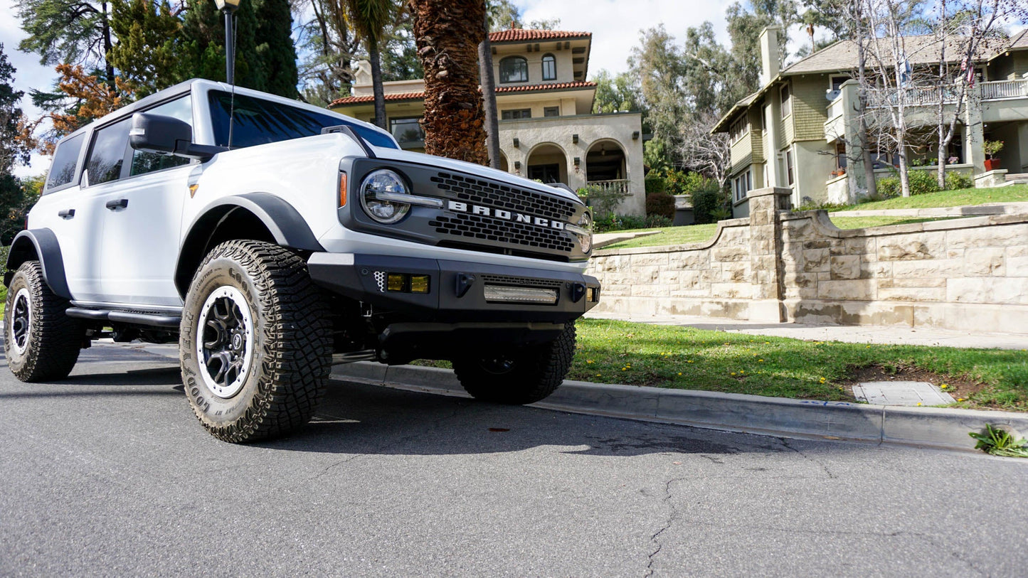 Bronco with off-road Front Bumper in front of house