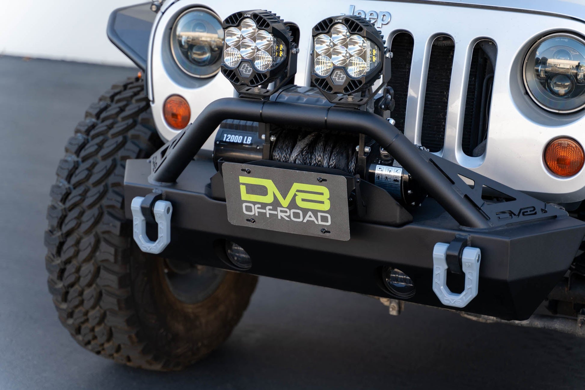 Angle shot of Fairlead Mounted Flip-Up License Plate Bracket