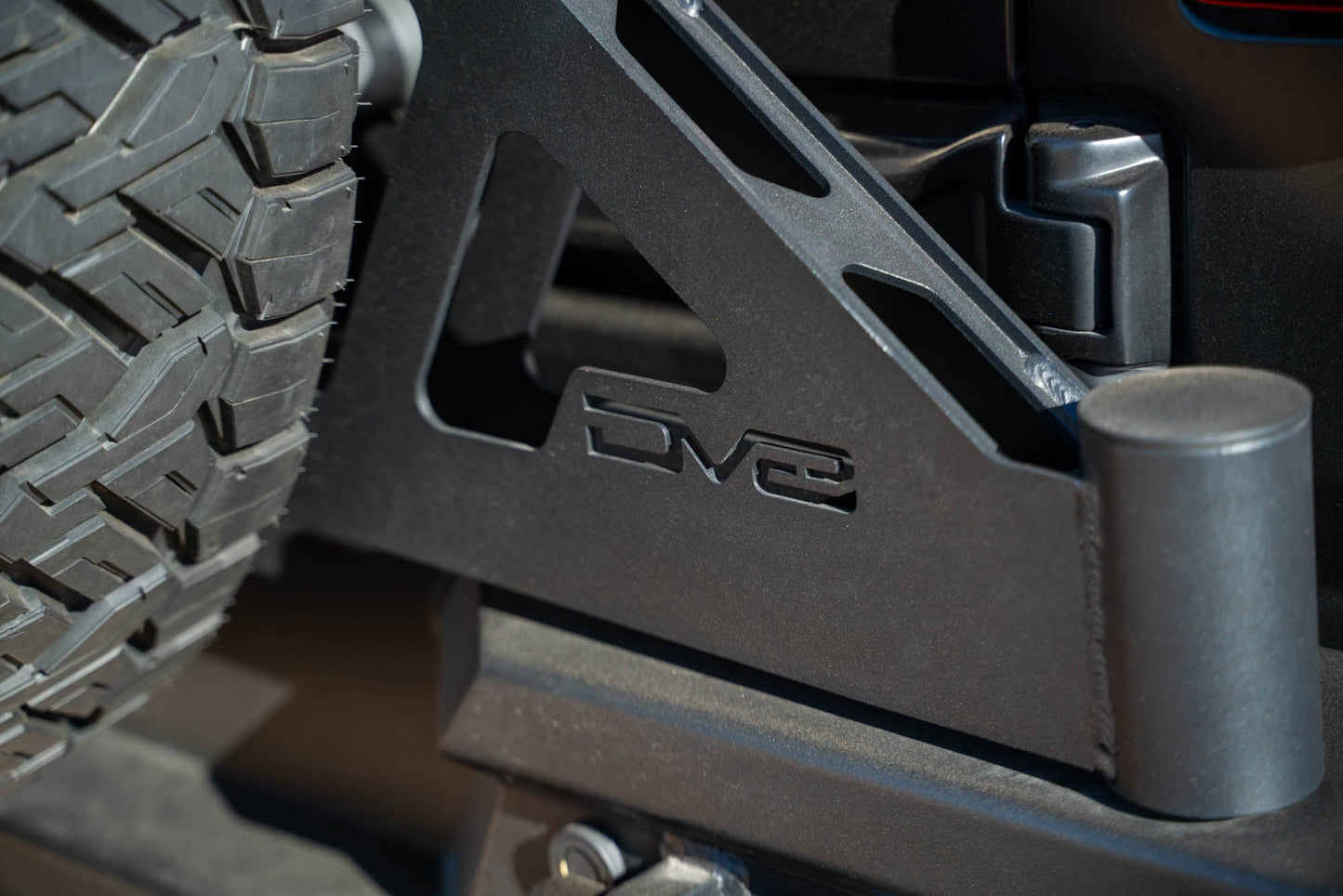 Tire Carrier on the Made to Overland Series Rear Bumper for the 2018-2024 Jeep Wrangler JL mounting point