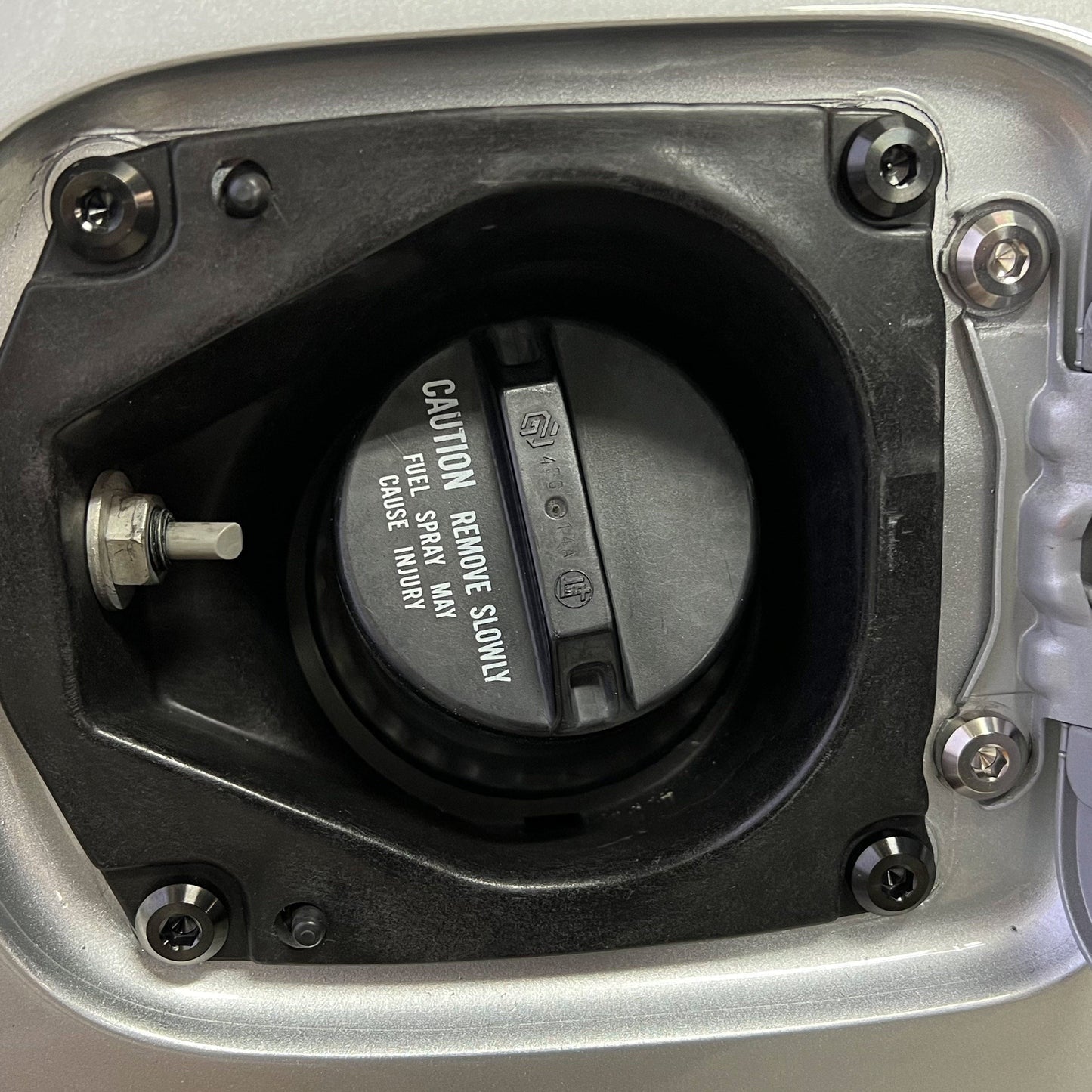 Titanium Hardware Fuel Door Kit - Toyota Supra MKIV (1993-2002)