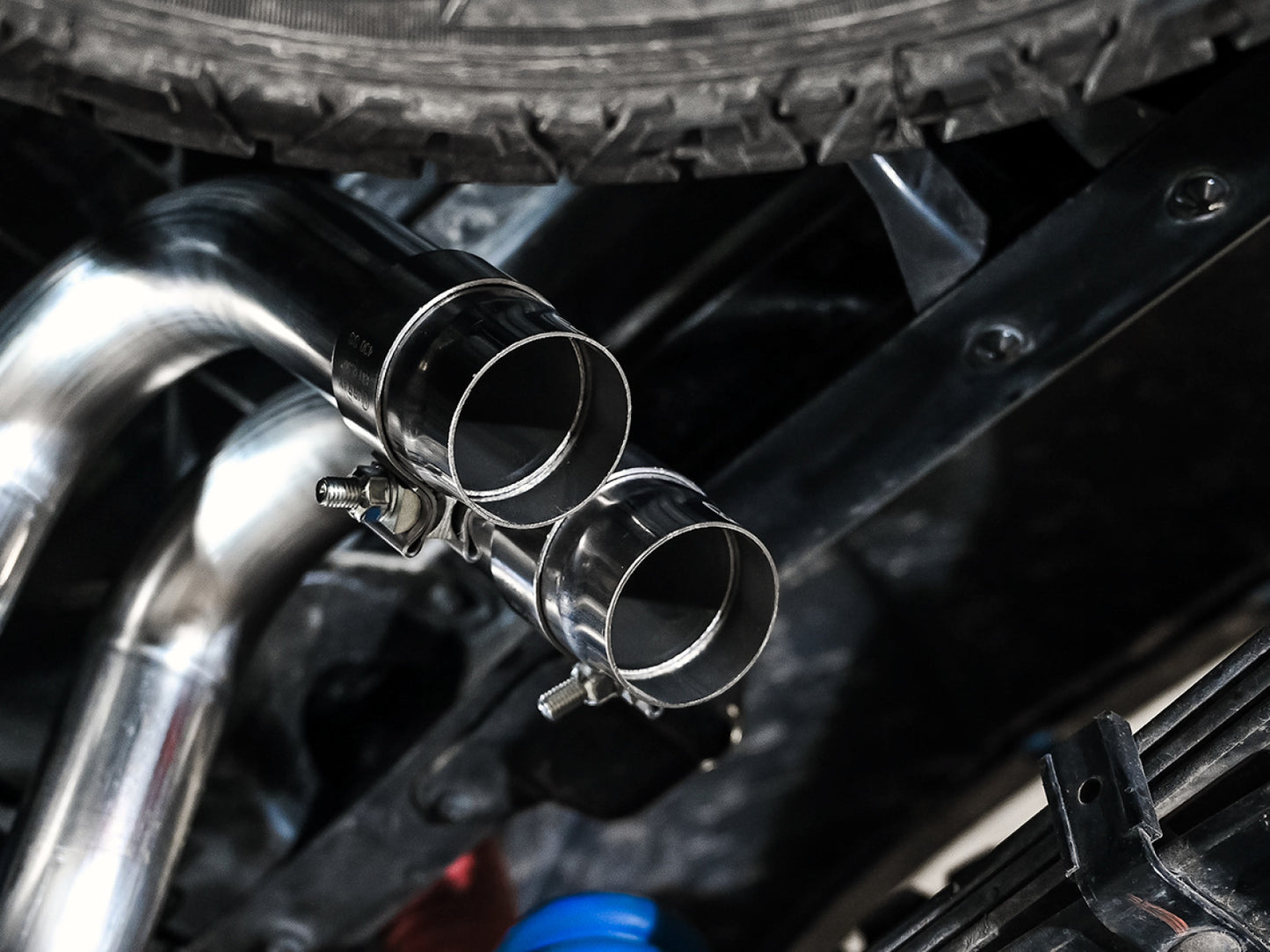 AWE Tuning 0FG Exhaust with BashGuard for 3rd Gen Tacoma - Dual Chrome Silver Tips 3015-32826