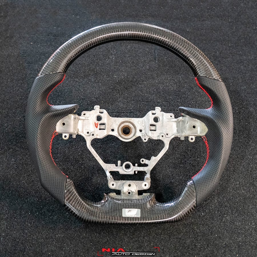 NIA Auto Design's carbon fiber steering wheel is made from a genuine 2x2 twill weave carbon fiber. Made for Lexus RCF. The steering wheel is Made out of an F Performance oem wheel, for perfect fitment. The comfort of a quality steering wheel can improve the drive-ability of your car while on the street or while racing on the track.