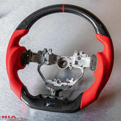 NIA Auto Design's carbon fiber steering wheel is made from a genuine 2x2 twill weave carbon fiber. Made for Lexus RCF. The steering wheel is Made out of an F Performance oem wheel, for perfect fitment. The comfort of a quality steering wheel can improve the drive-ability of your car while on the street or while racing on the track.