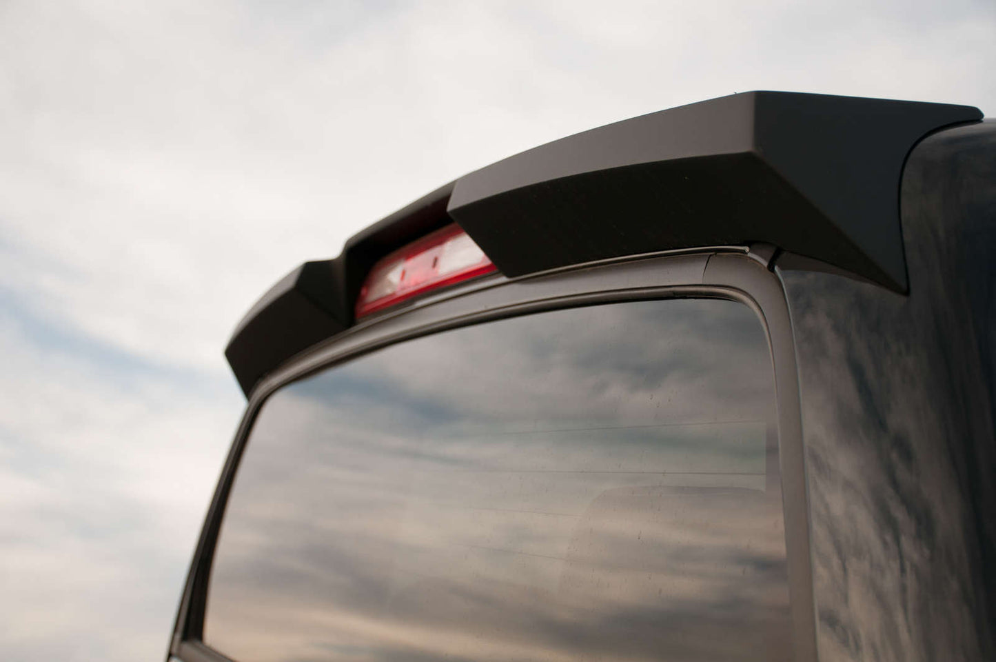 EGR - 985399 - USA Black Smooth Style Cab Spoilers