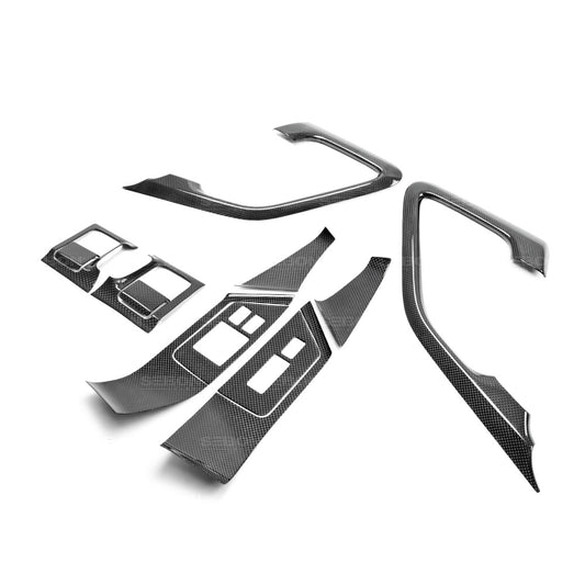 Seibon Carbon CFI0910NSGTR-C Carbon fiber interior door trim set (12 pcs) for 2009-2014 Nissan GTR Pieces include: Door handle cover (2) window switch panel cover (6) door lever surround (4)