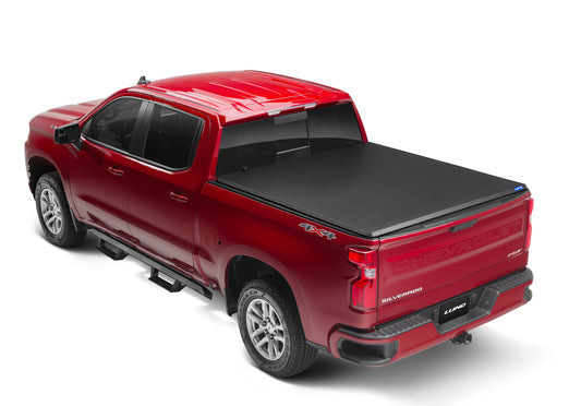 Lund 969150 Hard Fold Truck Bed Tonneau Cover For 1988-1999 C/K 1500-2500; 99-06 Silverado/Sierra 1500; 99-06 Silverado/Sierra 2500/3500; 2007 Classic Models; Fits 6.6 Ft. Bed