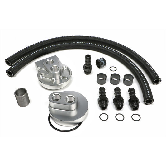 HAMBURGER'S PERFORMANCE PRODUCTS BILLET ALUMINUM SINGLE OIL FILTER RELOCATION KIT; VERTICAL PORT; 2-1/4 IN. I.D. 3-11/16 IN. O.D. OIL FILTER FLANGE; 1-1/2 IN.-12 NIPPLE- FORD DIESEL WITH 1 1/2-12 THREADS 3369